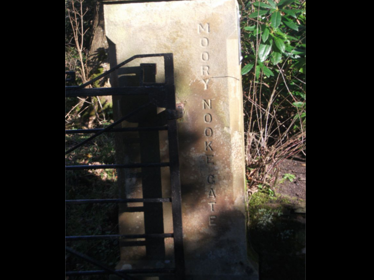 Close up of the gate post with inscribed name in 2012